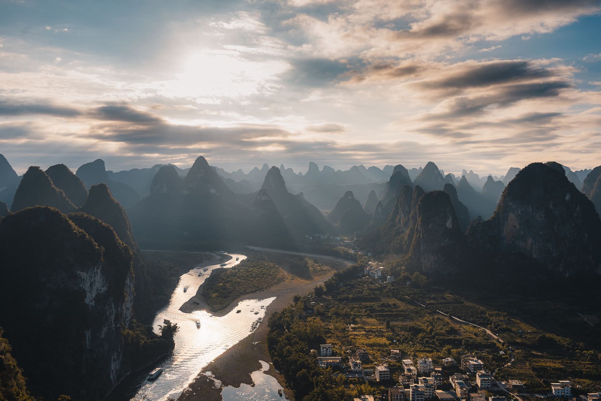 The Great Wall crossing green mountains in northern China